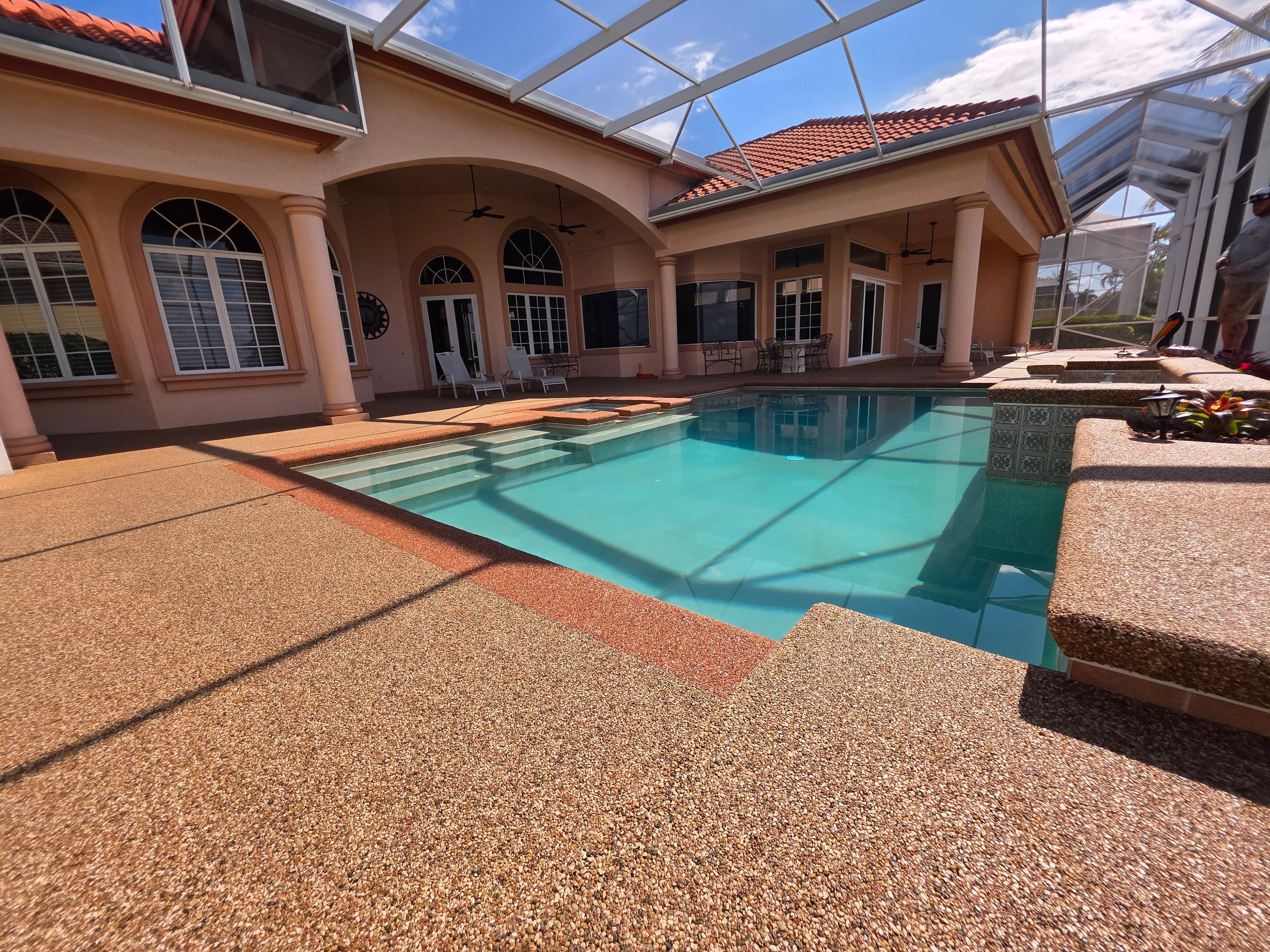 Pool deck in the Vuba Ellis Island blend at a Florida residence, Vuba reference installation