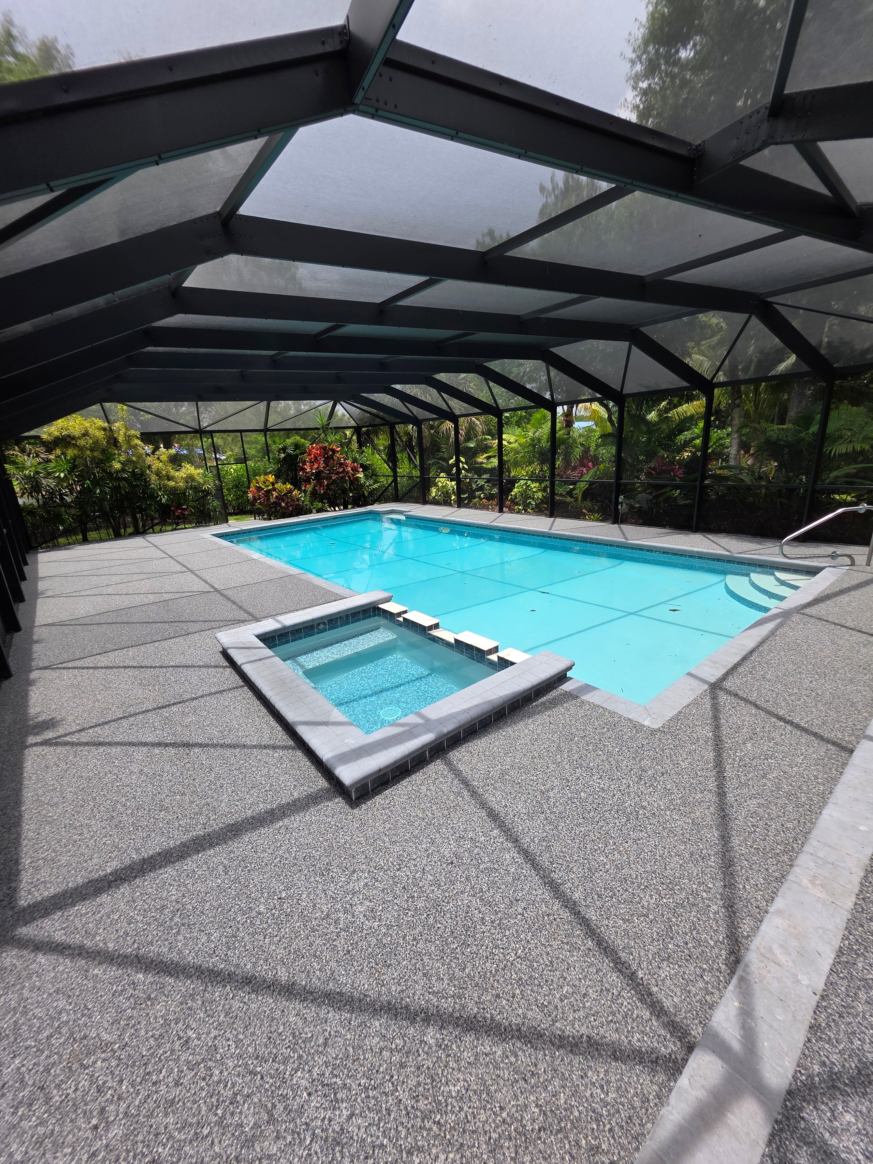 Bright, newly finished resin-bound pool deck, Vuba reference installation